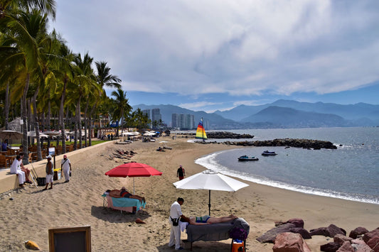 Beach umbrellas beside the sea in Puerto Vallarta
