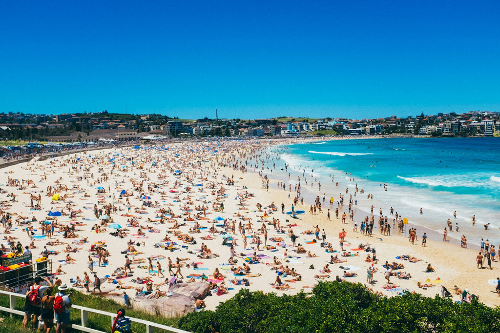 Sunbathers and swimmers on Bondi Beach in Sydney