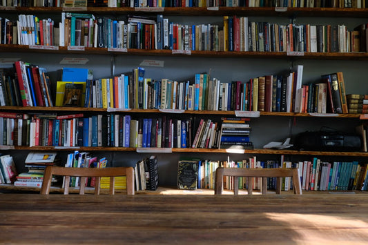 Wooden library shelves filled with books